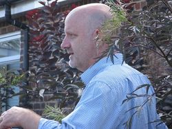 Head of Communications, Ross Newham, points out the elderberry cultivars developed at East Malling Research, August 2013