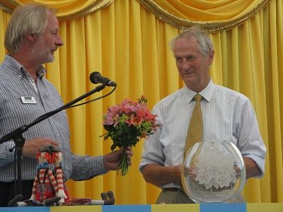 Phil Harkness presents Chris Warner with flowers, Hampton Court Flower Show 2014