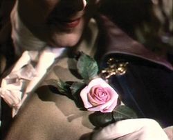 Marius Goring admires his rose in A Matter of Life and Death