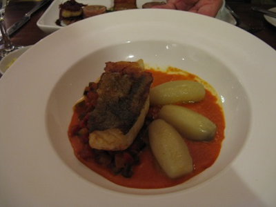 Oven roasted cod, chorizo ratatouille, fondant potatoes, red pepper coulis