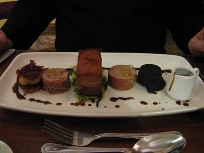 Slow Cooked Belly of Portk, Stuffed Tender Loin, Savoy Cabbage, Sauteed potatoes, homemade black pudding, red onion marmalade