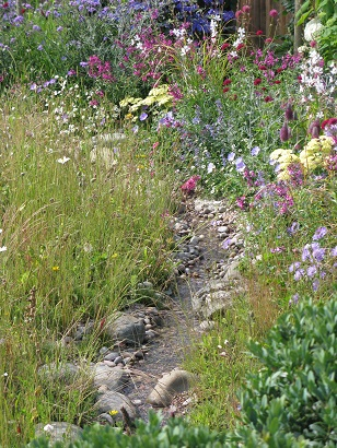 Squire's Garden Centres Urban Oasis, stream over pebbles, Hampton Court Flower Show 2015