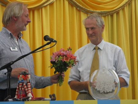 Phil Harkness presents flowers to Chris Warner, Hampton Court Flower Show 2014